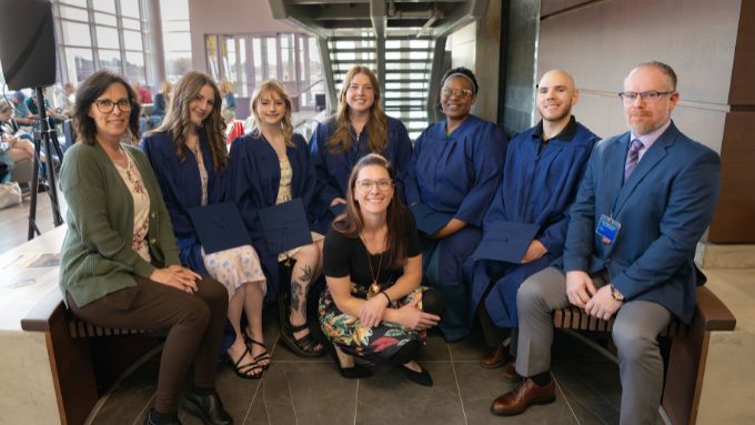 Group of massage therapy students with their instructors