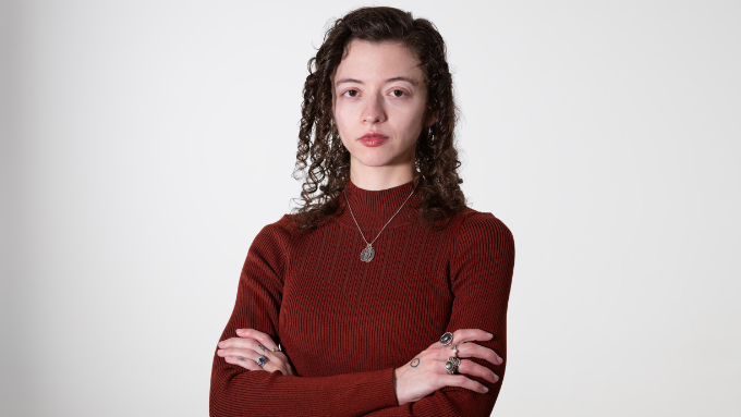 Caitlin Brainard wearing a red sweater