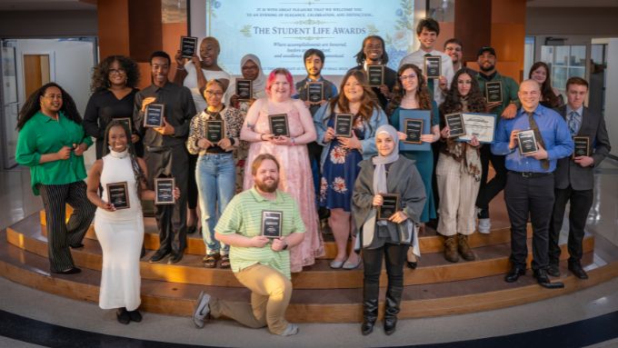Student Life Award honorees on stage in Stenstrom Student Center Atrium