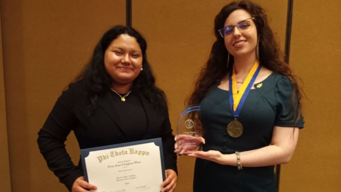 PTK officers holding a certificate