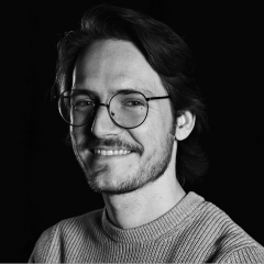 portrait of Nathan Talan in black and white