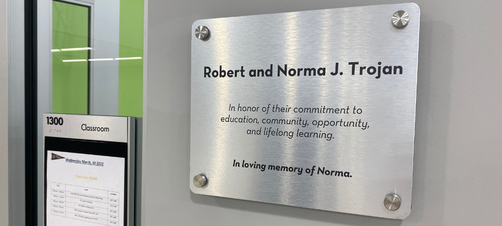 wall plaque showing room named in honor of Robert and Norma Trojan