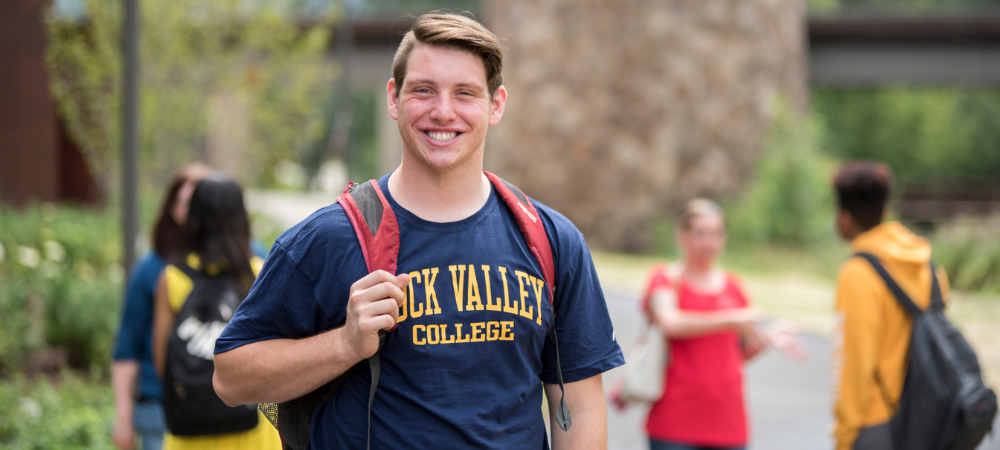 student wearing RVC blue shirt